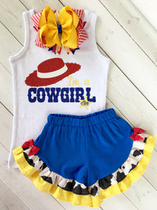 Disney outfits for girls, Disney outfits for toddlers inspired by Toy Story. I'm A Cowgirl in all glitter with personalized badge! Royal blue Toy Story inspired Shorts with cowhide and yellow check ruffles, finished off with red bows on either side.