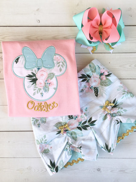 Gorgeous Disney outfit for girls, toddlers and babies. Minnie-like silhouette done in pretty floral fabir and aqua dot bow. Matching floral peek a boo shorts are perfection!