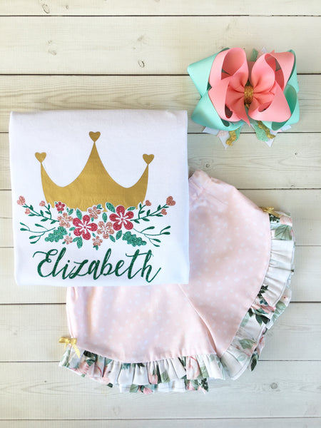 Gorgeous princess outfit for girls, toddlers and babies. Gold crown covered in glitter pink flowers customized with full name. Ruffled pink petal shorts are perfection!