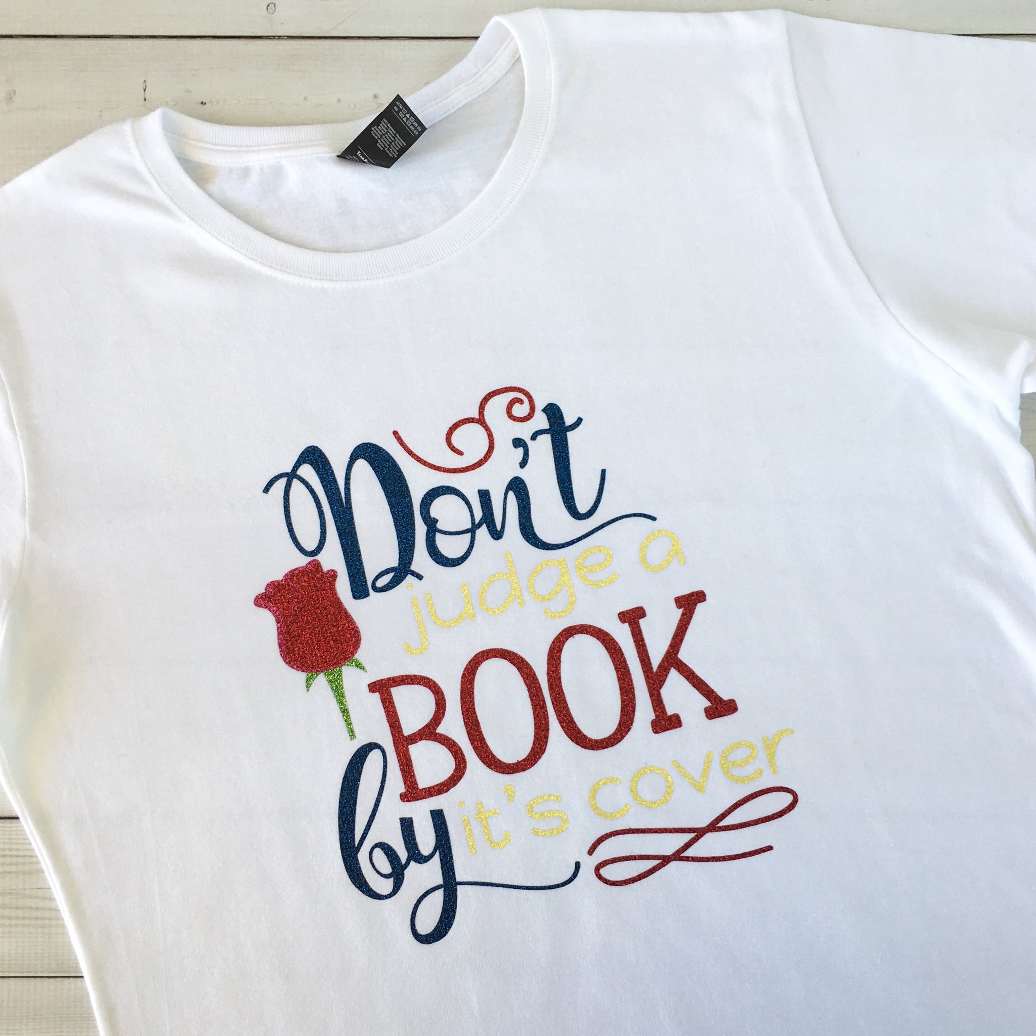 "Don't Judge a Book by It's Cover" Glitter Women's Shirt ONLY