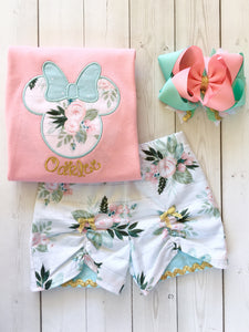Gorgeous Disney outfit for girls, toddlers and babies. Minnie-like silhouette done in pretty floral fabir and aqua dot bow. Matching floral peek a boo shorts are perfection!