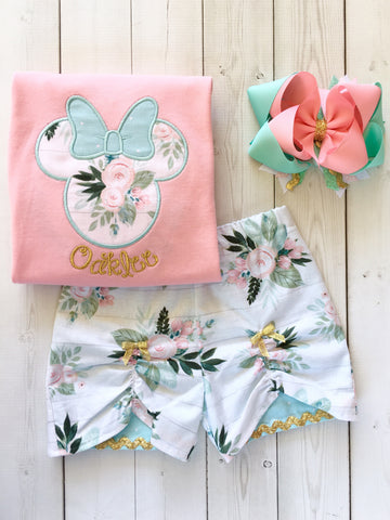 Gorgeous Disney outfit for girls, toddlers and babies. Minnie-like silhouette done in pretty floral fabir and aqua dot bow. Matching floral peek a boo shorts are perfection!