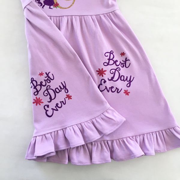 Disney dresses for girls toddlers babies. Tangled Inspired, Rapunzel inspired disney dress for girls on lavender dress with personalized glitter monogram on bodice and fully decorated skirt with best day ever and matching bow