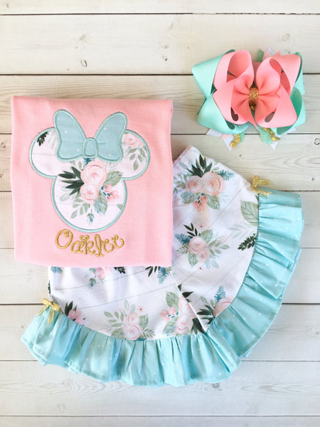 Gorgeous Disney outfit for girls, toddlers and babies. Minnie-like silhouette done in pretty floral fabir and aqua dot bow. Matching floral ruffled shorts are perfection!